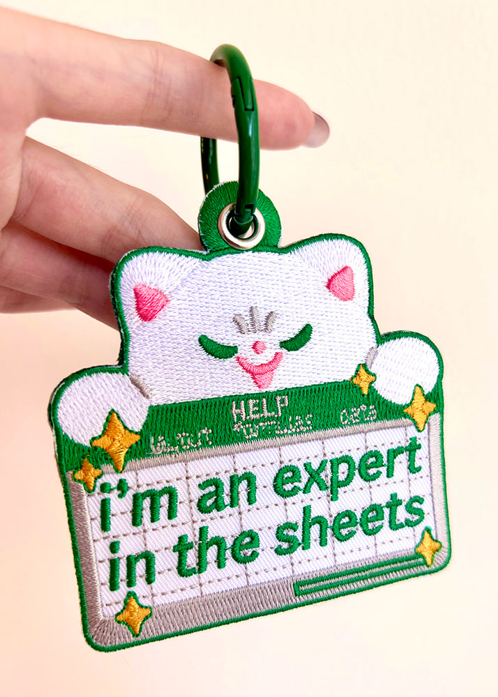 Expert in The Sheets Embroidered Keychain