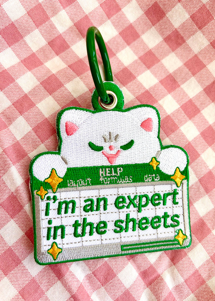 Expert in The Sheets Embroidered Keychain